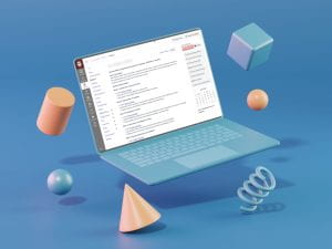 Laptop computer surrounded by colorful three-dimensional shapes